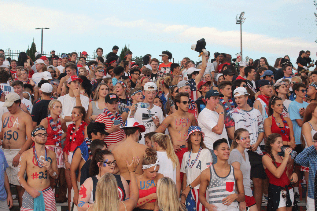 The student section sports all types of red, white, and blue to coincide with the game's theme.