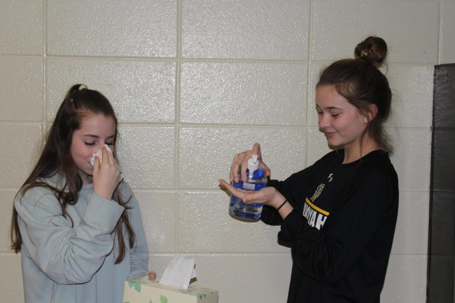 Sophomore Gabby Troche and sophomore Madi Foley relive their experience with the flu. Unfortunately, our sanitized journalism room could not protect them from getting the flu.  