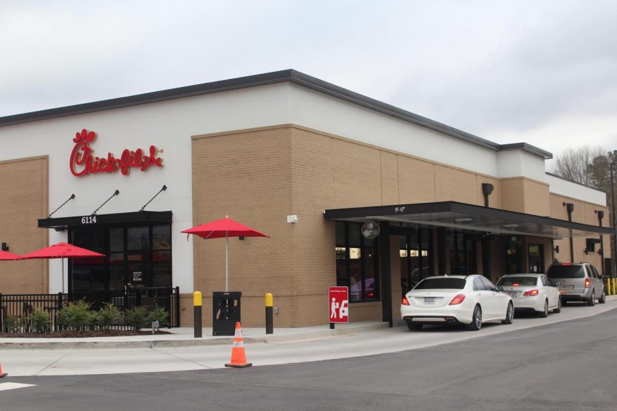 Cars+line+up+in+the+drive-thru+of+the+new+Chick-fil-A.+The+Chick-fil-A+opened+Jan.+9.