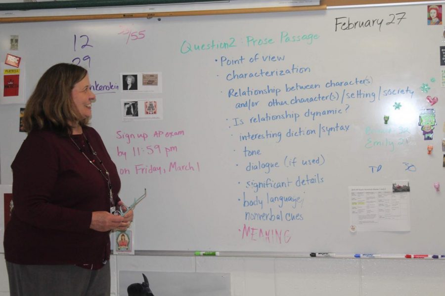 
Ms. Elaine Dasher helps students answer a prose essay free response question. Dasher teaches AP English Literature and Composition, a course offered to seniors. 