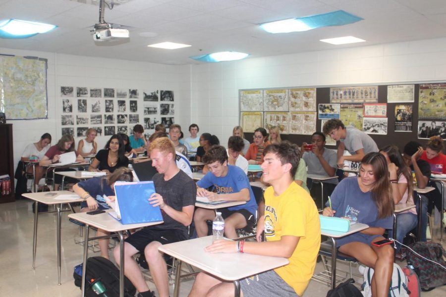 Mr. Andy Maxwell’s sixth period US History class listens along during a lecture. Last year Mr. Maxwell’s largest class had fewer than 30 students, but this year almost all his classes have over 30 students. Photo by Emily Hill 