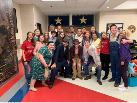 Second left, front: Senior Zane Durham 

Sixth from the left, center: Senior Jace Nichols 

Seventh from the left, center: Junior Randy Miller 

The cast and crew of “The Diviners” pose for a picture at the GHSA AAAAAA theatre competition. Their abridged performance of the play earned them second place. (Photo from Angie Miller) 