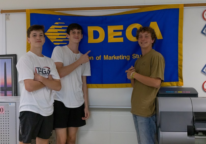 Juniors Evan Case, Nick Levantis, and Ryder Moye are DECA members. DECA has found ways to make their meetings safe and socially distant.