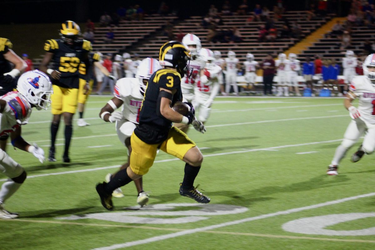 Will Rajecki runs the ball to the endzone. The Chiefs beat Riverwood 50-7.